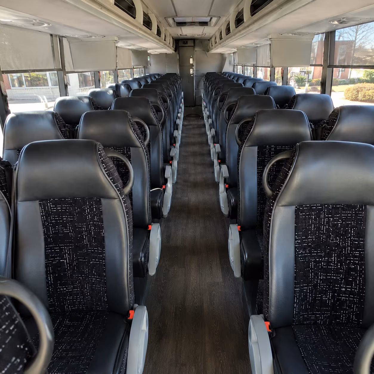 plano 54 passenger charter bus inside